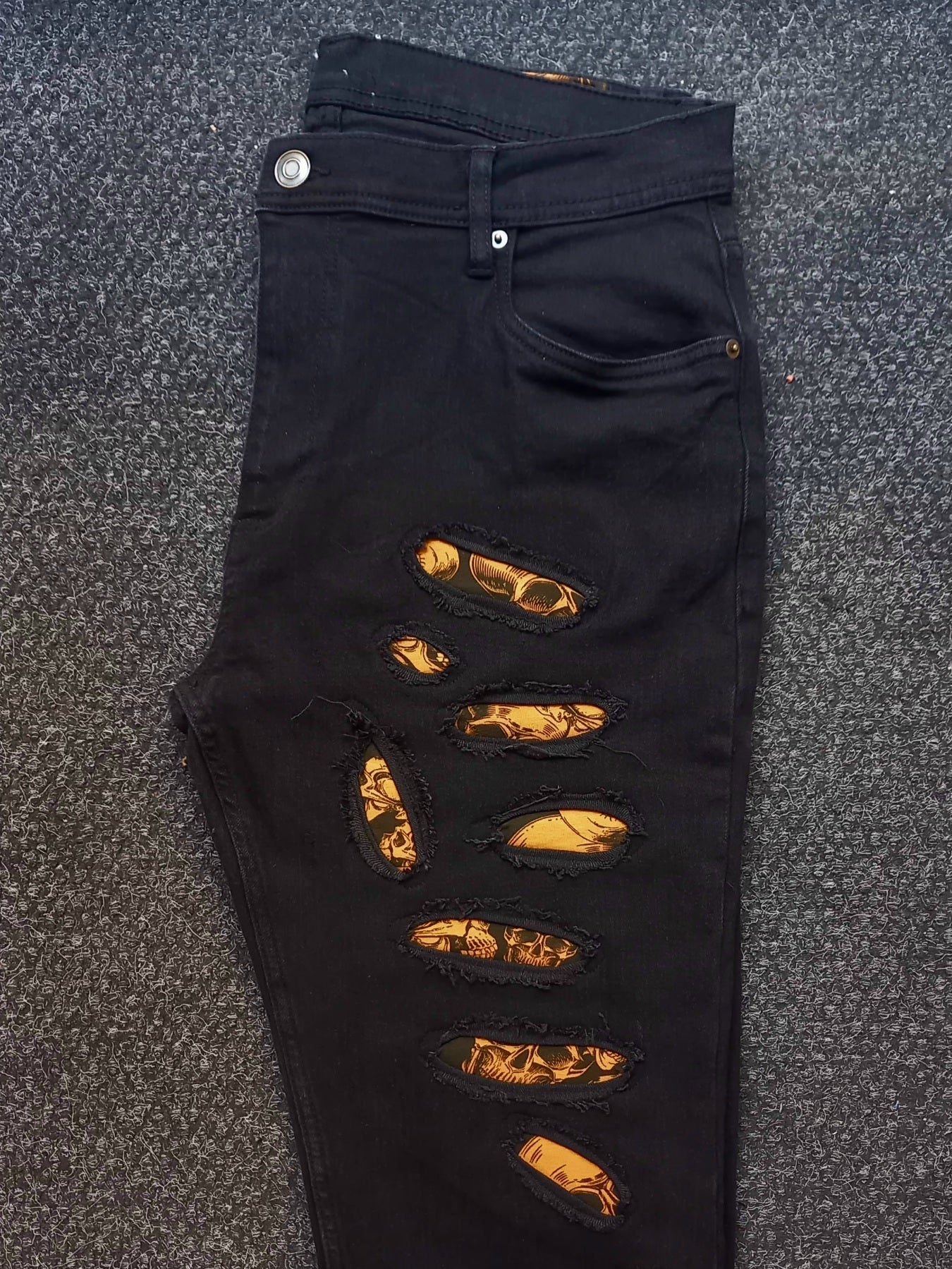 Black Custom Skinny Jeans Orange Skulls
