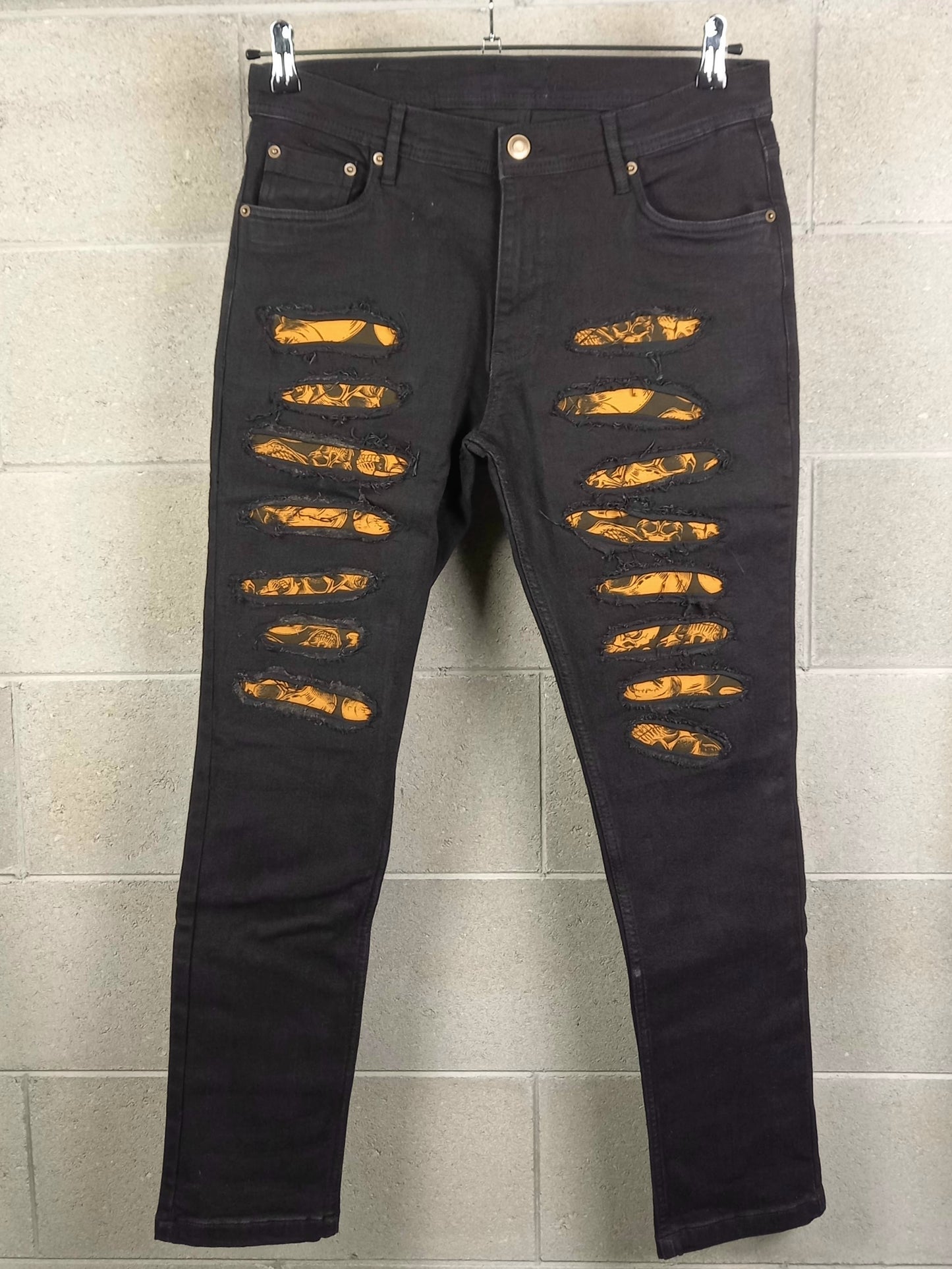 Black Custom Skinny Jeans Orange Skulls